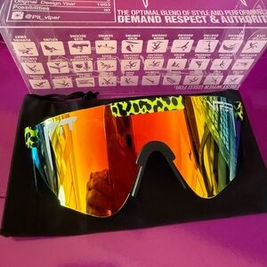 Pit Viper Sunglasses with Vibrant Orange and Yellow Accents
